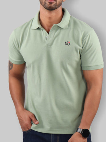 A man Standing with wearing Mint Green Polo Neck T-Shirt